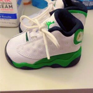 Jordan White and Green Sneakers Athletic Design